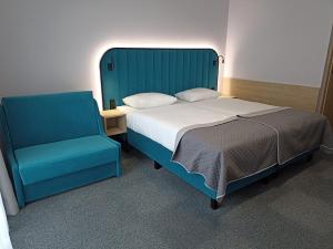 Hotel Pietrak客房内的一张或多张床位