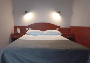 Hotel Pietrak客房内的一张或多张床位