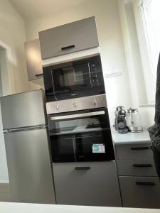 Kuchyň nebo kuchyňský kout v ubytování Gaelle Voghera apartment