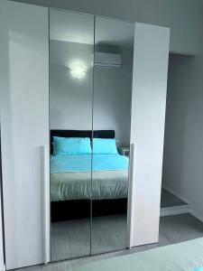 Postel nebo postele na pokoji v ubytování Gaelle Voghera apartment
