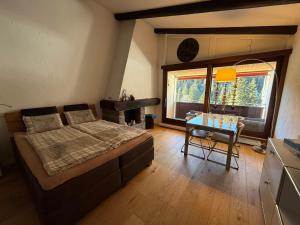Postel nebo postele na pokoji v ubytování Laax-Relax