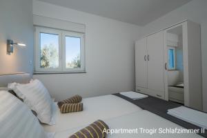 Posteľ alebo postele v izbe v ubytovaní Ferienhaus Elias Nikola