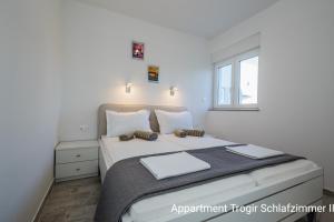Posteľ alebo postele v izbe v ubytovaní Ferienhaus Elias Nikola