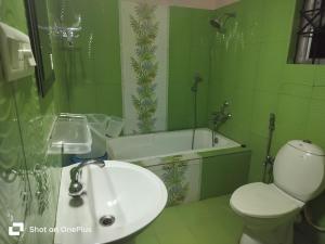 Koupelna v ubytování Gram Bangla Resort