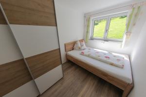 Posteľ alebo postele v izbe v ubytovaní Appartement Premsteingut