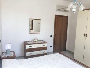 A bed or beds in a room at Charming apartment Menfi sea view