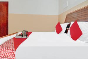 Postel nebo postele na pokoji v ubytování Hotel O City Lodge