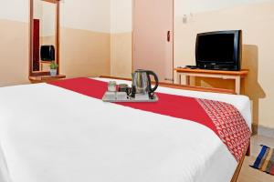 TV a/nebo společenská místnost v ubytování Hotel O City Lodge