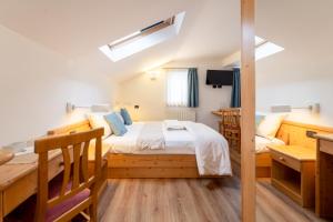 Voodi või voodid majutusasutuse Negritella Sweet Hotel toas
