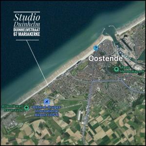 a map of a city next to the water at Duinhelm Vakantiestudio Mariakerke - A cosy place by the sea in Ostend
