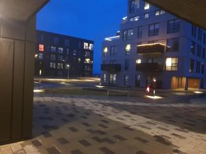 a view of an empty city at night at Ecological seaside apartament in Reykjavík
