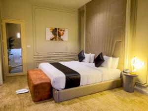 a bedroom with a large bed in a room at Eastern Al Montazah Hotel in Alexandria