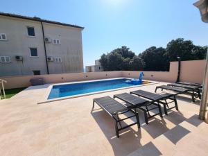 Gallery image of Coco Villa & apartments with heated pool in Kožino