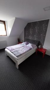 Postel nebo postele na pokoji v ubytování Hotel & Restaurant - Zum Schleicher Kuckuck