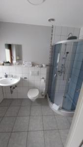Koupelna v ubytování Hotel & Restaurant - Zum Schleicher Kuckuck