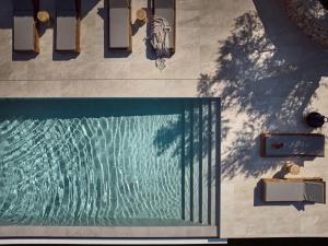 an overhead view of a swimming pool in a house at Zakynthos Villa with Stunning Views in Agios Nikolaos +4 photos