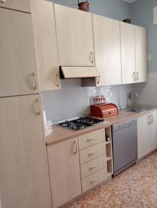 A cozinha ou kitchenette de Un mare di relax