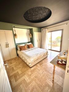 Postel nebo postele na pokoji v ubytování Smala Beldi Guest House