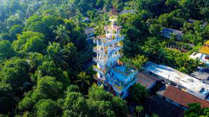 an overhead view of a building in the jungle at The Hotel Ujaliya in Ratgama Hegoda