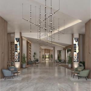 a rendering of a lobby with a chandelier at Radisson Hotel Jeddah Tahlia in Jeddah +85 photos