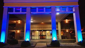 a building with blue lights on it at night at Americas Best Value Inn - Collinsville / St. Louis in Collinsville
