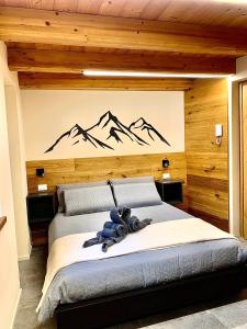 Postel nebo postele na pokoji v ubytování Casa "Arvier" CIR n 0046