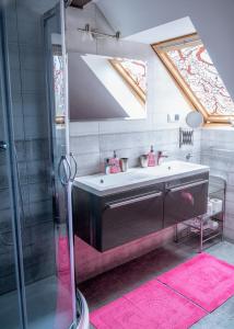 a bathroom with a sink and a shower at Apartament Agro&Art in Płocin +154 photos