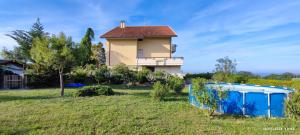a house with a swimming pool in a yard at Casa vacanze Mare Monti in Grottammare