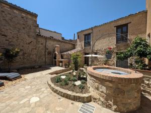 a courtyard with a pool in a building at Passo del Mattino in Locati +79 photos