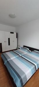 Ένα ή περισσότερα κρεβάτια σε δωμάτιο στο Accommodation Centar, Murter
