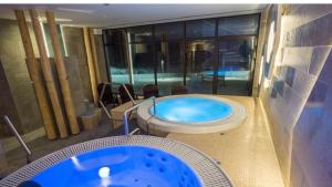 a jacuzzi tub on a balcony in a hotel at U Tadeka in Krásno nad Kysucou