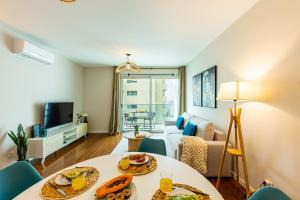 TV a/nebo společenská místnost v ubytování Formosa Stay IV by YOUR KEY