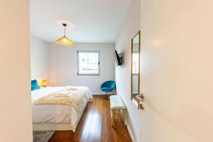 Ένα ή περισσότερα κρεβάτια σε δωμάτιο στο Formosa Stay IV by YOUR KEY