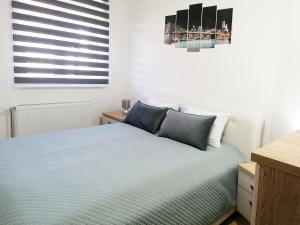 Ένα ή περισσότερα κρεβάτια σε δωμάτιο στο Apartman Cvetkovic