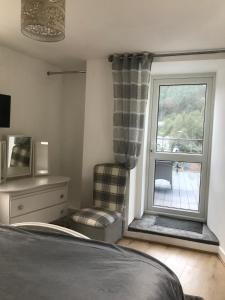 Istumisnurk majutusasutuses Valley View Cottage with stunning balcony views!