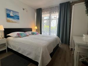 Postel nebo postele na pokoji v ubytování Apartment in Casa Porta Luna, Gajac, Novalja