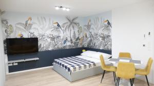 Μια τηλεόραση ή/και κέντρο ψυχαγωγίας στο Mistral Residenc 102