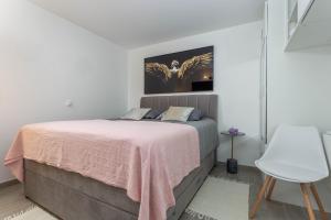 Posteľ alebo postele v izbe v ubytovaní Apartment Queen Hvar + 14 fotografií