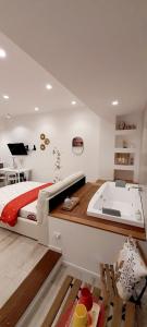 a bedroom with a bed and a bath tub at BARBARA Classy Apartments 103, Wellness in Siracusa