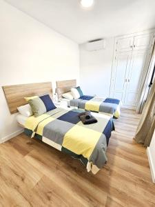 Ένα ή περισσότερα κρεβάτια σε δωμάτιο στο Apartamento Caletillas, Candelaria Chovicabeach