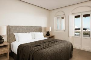 Voodi või voodid majutusasutuse NĒRO Suites by NOMÉE Hospitality Group toas