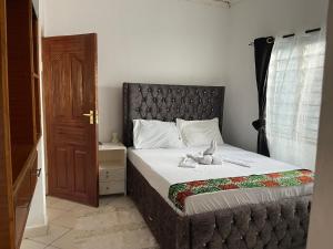 Ένα ή περισσότερα κρεβάτια σε δωμάτιο στο Cozy 2Bdrm Chill out Villa with Private Yard +10 φωτογραφίες