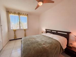 Giường trong phòng chung tại Magnifique appartement terrasse -36-