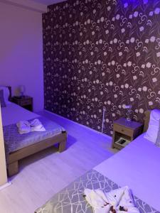 Postel nebo postele na pokoji v ubytování Apartmani CENTAR- Smederevo