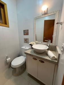 Koupelna v ubytování Chalé Villagio Monte Verde + 26 fotografií