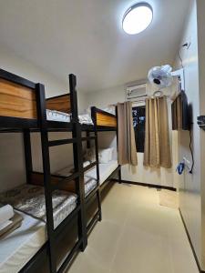 Postel nebo postele na pokoji v ubytování JaiJai's Backpackers Inn