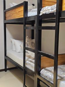 Postel nebo postele na pokoji v ubytování JaiJai's Backpackers Inn