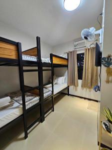 Postel nebo postele na pokoji v ubytování JaiJai's Backpackers Inn