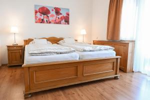 Ένα ή περισσότερα κρεβάτια σε δωμάτιο στο HOTEL DIANA apartments