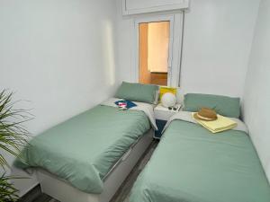 Postel nebo postele na pokoji v ubytování Cunit Vacation